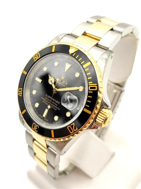 rolex submariner two tone black 16613|rolex 16613 price guide.